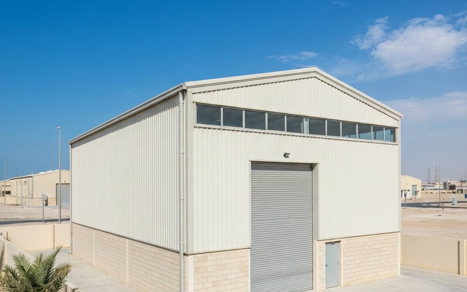 A completed industrial workshop building on handover day.
